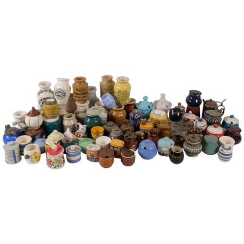 669 - A boxful of ceramic and other mustard pots, etc