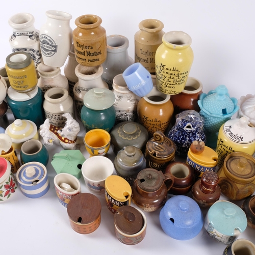 669 - A boxful of ceramic and other mustard pots, etc