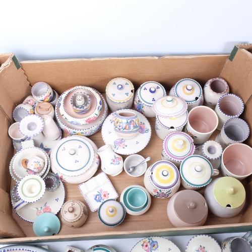 670 - A boxful of Poole Pottery jam pots, candlesticks, floret vases etc