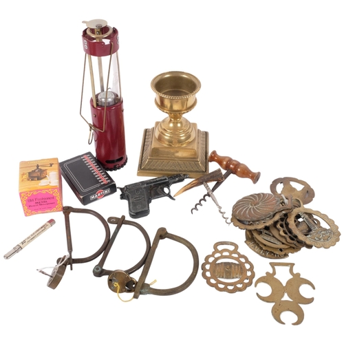 684 - Bushtec lantern, horse brasses, corkscrews, a spud gun, etc