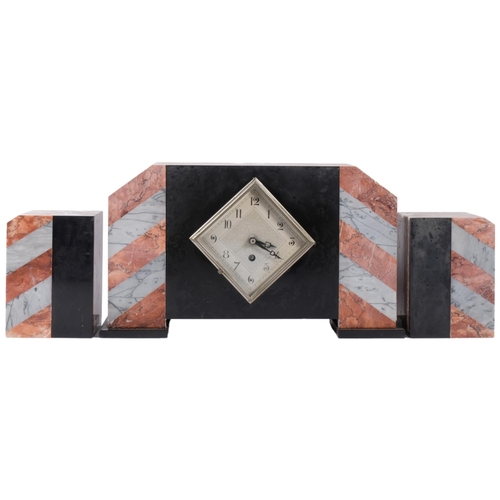 692 - A French Art Deco two-colour marble and slate-cased mantel clock garniture, replacement quartz mecha... 