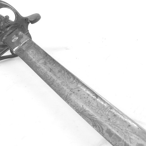 90 - An 1827 pattern Officer's sword, with engraved blade and pierced guard with cipher, blade length 82c... 