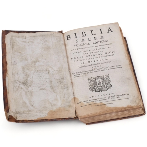 122 - A 18th century leather-bound Bible (Biblia Sacra Vulgat additions Sizti V dated 1716)