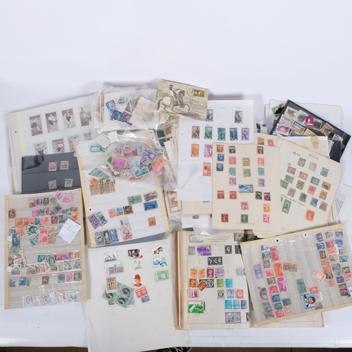 135 - A large collection of loose worldwide postage stamps, airmail envelopes etc (boxful)