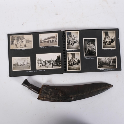 142 - A Malayan kukri knife in leather scabbard, and a photograph album containing photographs from Bombay... 