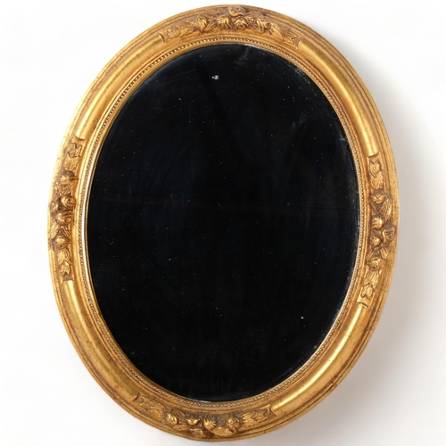 161 - An oval gilt-framed wall mirror, H52cm