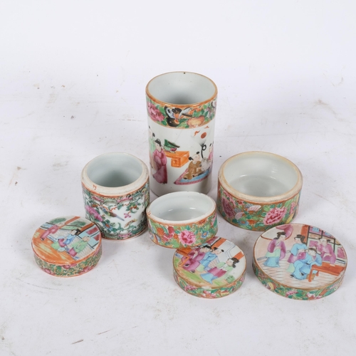 173 - A group of early 20th century hand painted famille rose enamelled Canton pots with associated lids, ... 