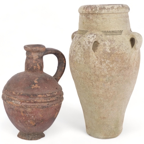 188 - An Ancient pottery jug, and a similar pottery vase with handles, largest height 41cm (2)