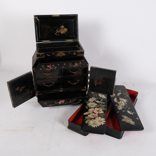 201 - A small black lacquered mother-of-pearl inlaid Chinese table-top jewellery box, with a total of 2 lo... 