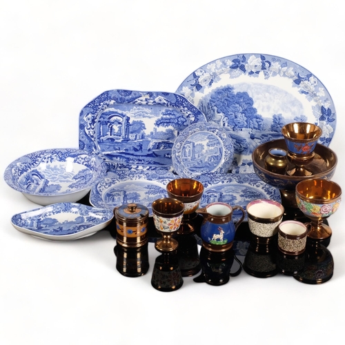 215 - A selection of copper lustre ware, including various goblets, centrepiece bowls, etc, and a selectio... 