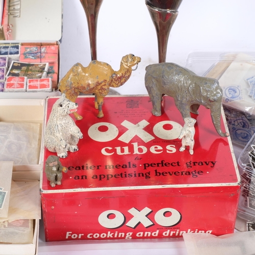 217 - A selection of British and worldwide stamps, many loose, several stock books, and a Vintage Oxo Cube... 