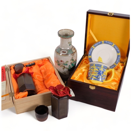 224 - A Chinese framed calligraphy brush set, reproduction crackle glaze vase, a sacer boxed cup and sauce... 