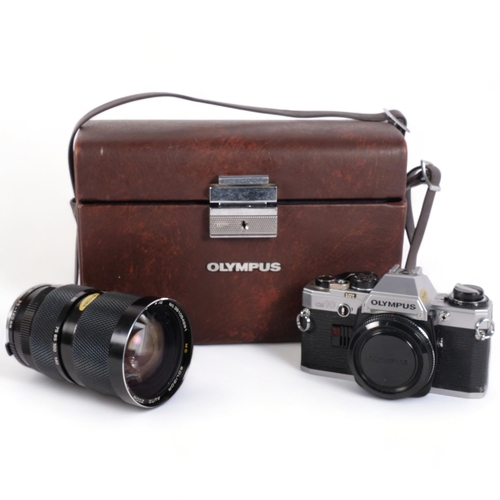 244 - An Olympus OM10 camera, and an associated Soligor autozoom 35-140MM,F:3.5 Macro lens, serial no. 381... 