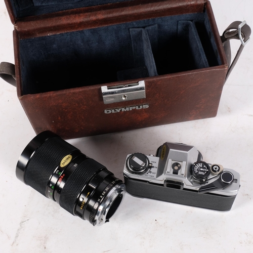 244 - An Olympus OM10 camera, and an associated Soligor autozoom 35-140MM,F:3.5 Macro lens, serial no. 381... 