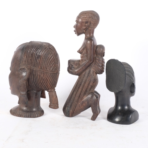 253 - A group of 3 hardwood African Tribal figures, including 2 hardwood busts and a kneeling fertility fi... 