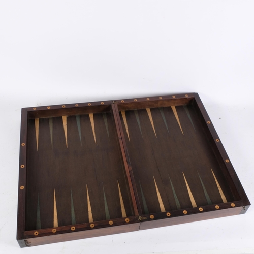 258 - A stunning Victorian rosewood games companion, with hinged bracket locks to the side, closed dimensi... 