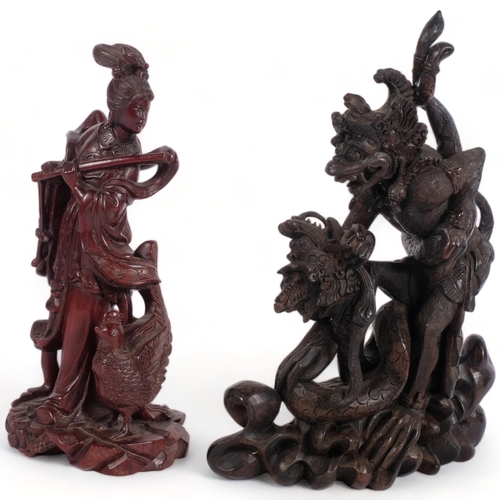 272 - A high quality carved Chinese dragon figure mounted on a serpent, H30cm, and a Chinese carved wood f... 