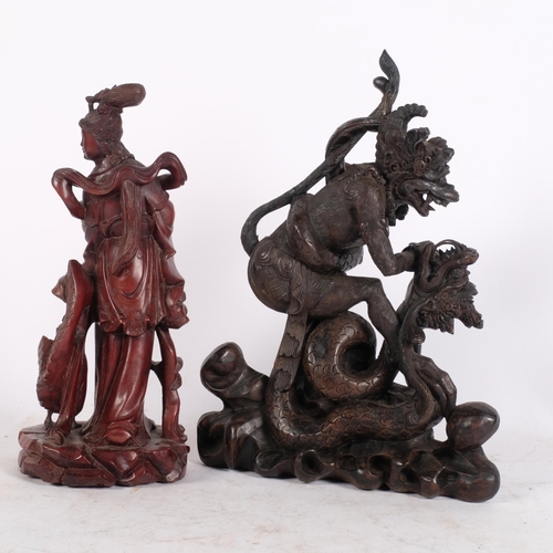 272 - A high quality carved Chinese dragon figure mounted on a serpent, H30cm, and a Chinese carved wood f... 