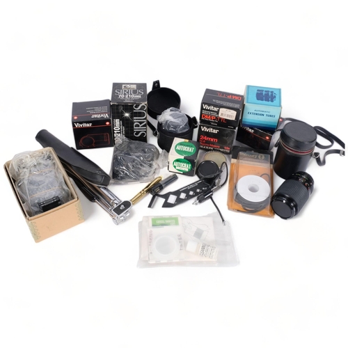 280 - A quantity of Vintage camera equipment and accessories, including various lenses, and brands such as... 