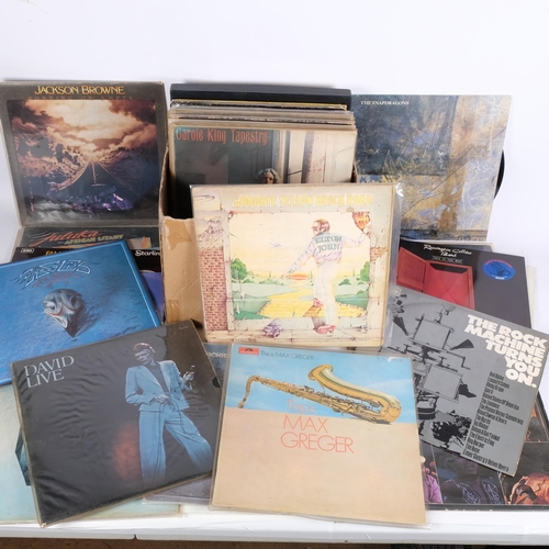 285 - A quantity of vinyl LPs, various artists and genre, including such artists as Elvis, Jackson Browne,... 