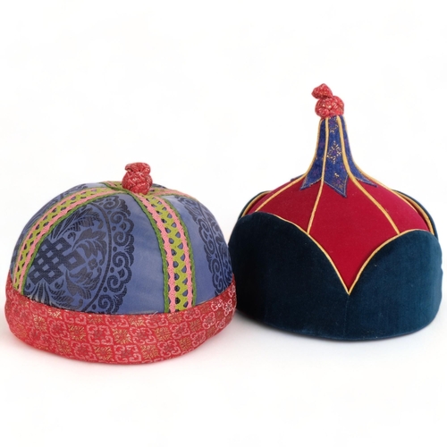 300 - 2 similar Mongolian hats, likely from the area of Ulaan Bataar, a male and a female hat, the male ha... 