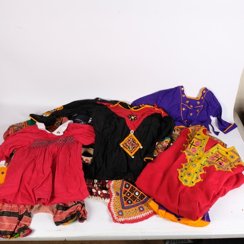 301 - A quantity of traditional Mongolian attire, a selection of hand and machine sewn garments, garments ... 