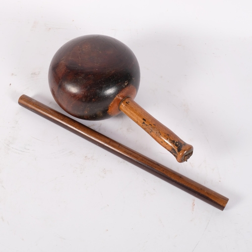 77 - A turned hardwood rolling rule, and a Vintage hardwood mallet