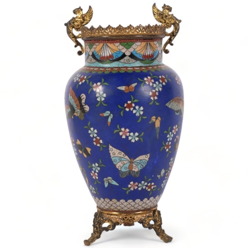 79 - 19th century blue ground cloisonne vase, decorated with floral stays and butterflies, gilt-metal gri... 