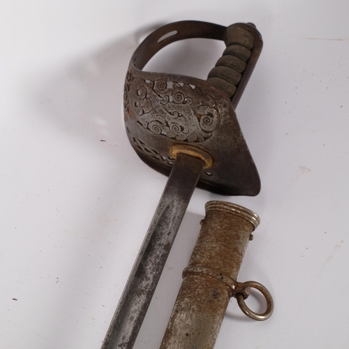 88 - An 1897 pattern Infantry Officer's sword, with pierced scabbard and George V cipher, and shagreen ha... 