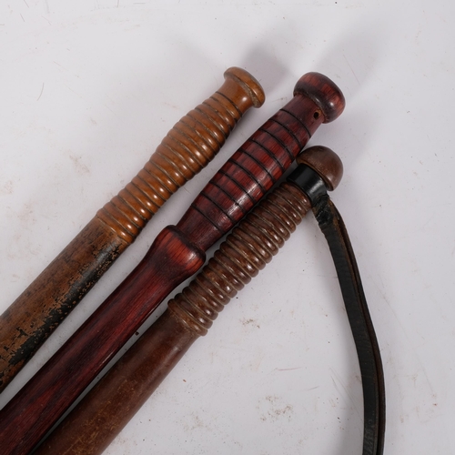 96 - An Antique turned wood truncheon, with painted body and ribbed handle, 41cm, and 2 other unmarked tu... 