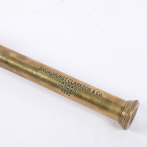 702 - A reproduction brass 4-draw telescope