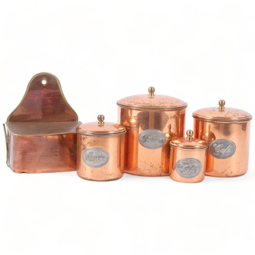 703 - A graduated set of French copper kitchen storage jars, largest Farine, 15cm, and a wall-mounted box ... 