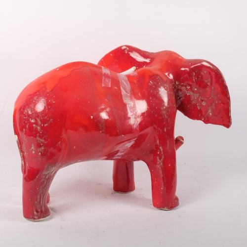 709 - A David Sharp Rye red pottery elephant figure (tusks broken but present), H34cm