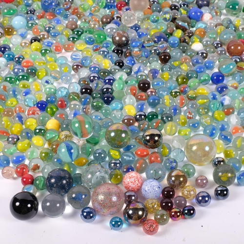 711 - A large boxful of glass marbles