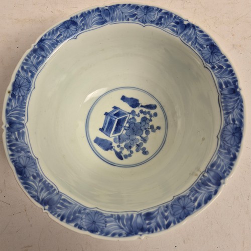 168 - A group of modern Oriental ceramic items, including a blue and white centrepiece bowl, with 6 charac... 