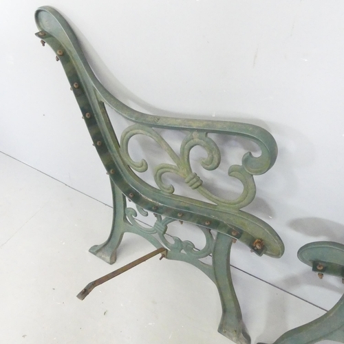 64 - A pair of painted cast iron bench ends. Height 78cm.