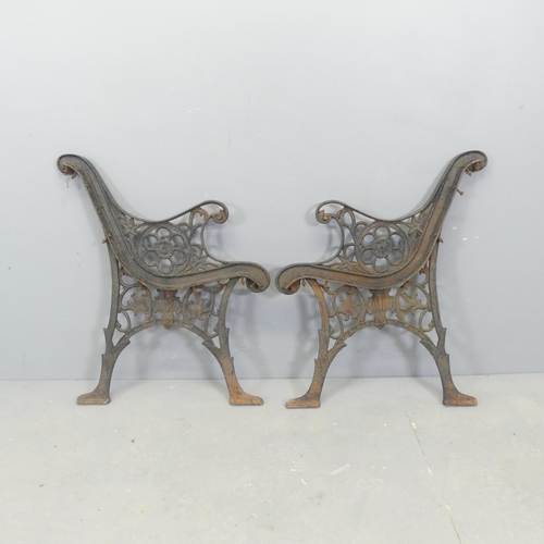 65 - A pair of painted cast-iron bench ends. Height 72cm.