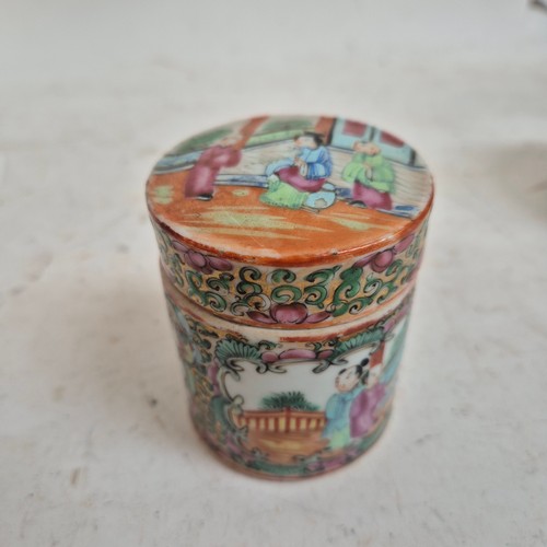 173 - A group of early 20th century hand painted famille rose enamelled Canton pots with associated lids, ... 