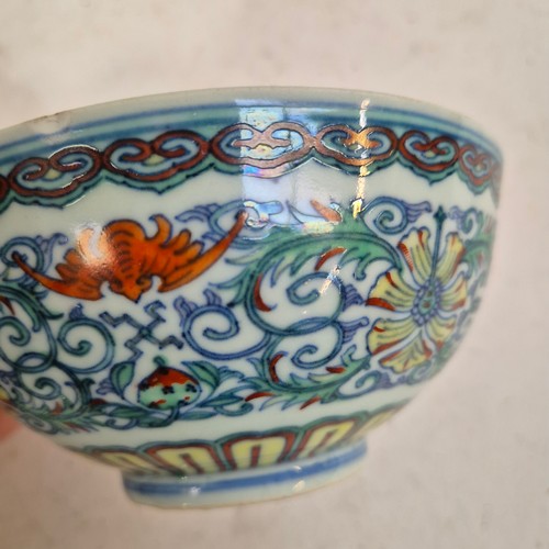 168 - A group of modern Oriental ceramic items, including a blue and white centrepiece bowl, with 6 charac... 