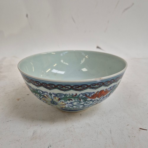 168 - A group of modern Oriental ceramic items, including a blue and white centrepiece bowl, with 6 charac... 