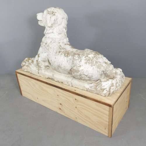 37 - A weathered and painted cast stone garden statue, study of a hound, displayed on plywood plinth. Dim... 