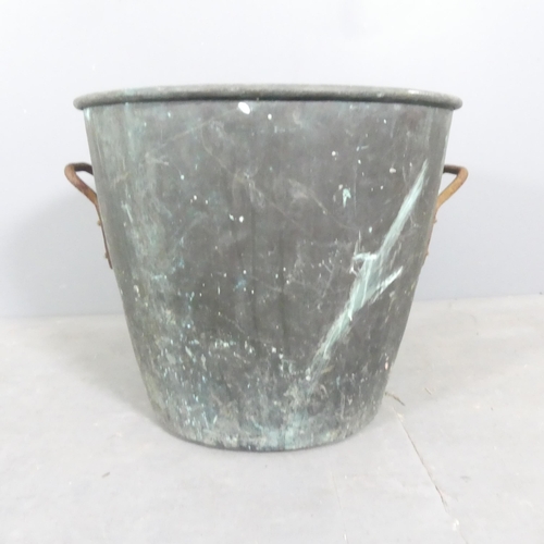 73 - A zinc lined copper log basket. 54x48cm.