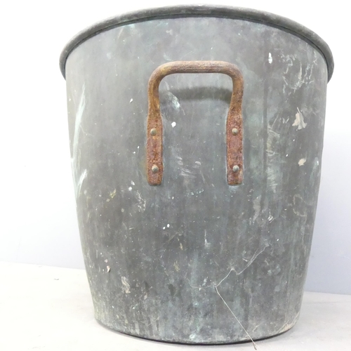 73 - A zinc lined copper log basket. 54x48cm.