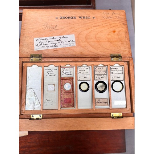 26 - A collection of eight antique softwood microscope slide collectors boxes containing an extensive col... 