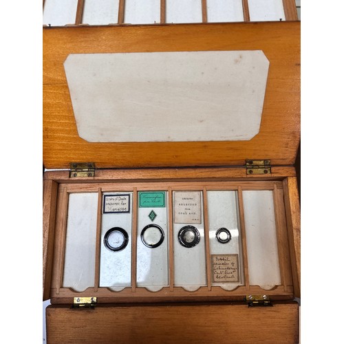 26 - A collection of eight antique softwood microscope slide collectors boxes containing an extensive col... 