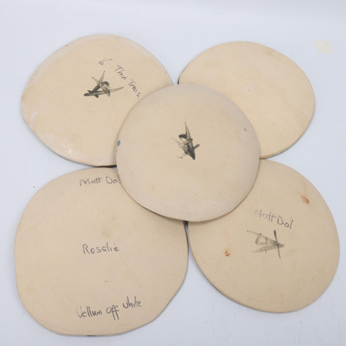 104 - JANE ABBOTT , a set of 5 slab ceramic plates, glaze notes to back, largest diameter 17cm