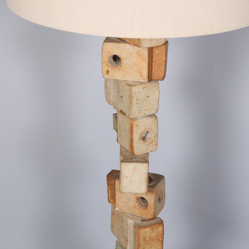 108 - BERNARD ROOKE (b1938), A large brutalist ceramic floor lamp, a block section totem body, with rattan... 