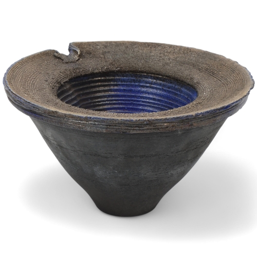 116 - DAVID HOWARD JONES (b.1953), a thrown and altered raku vessel, blue metallic glaze to interior and d... 