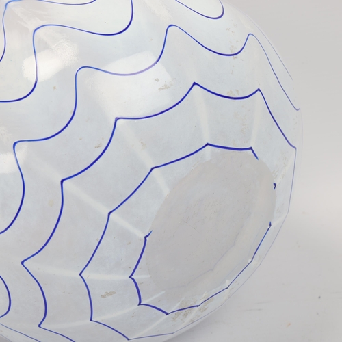 120 - ULRICA HYDMAN-VALLIEN (1938-2018), for Kosta Boda, an opaque white glass bowl with blue wave pattern... 