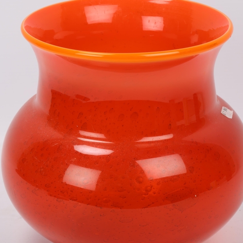 135 - ERIK HOGLUND, Sweden, for Boda glassworks, a red glass vase, designed 1950s', with internal bubbles ... 